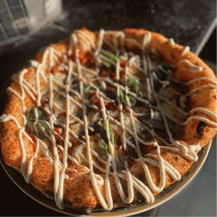 Pizza aus dem Holzofen